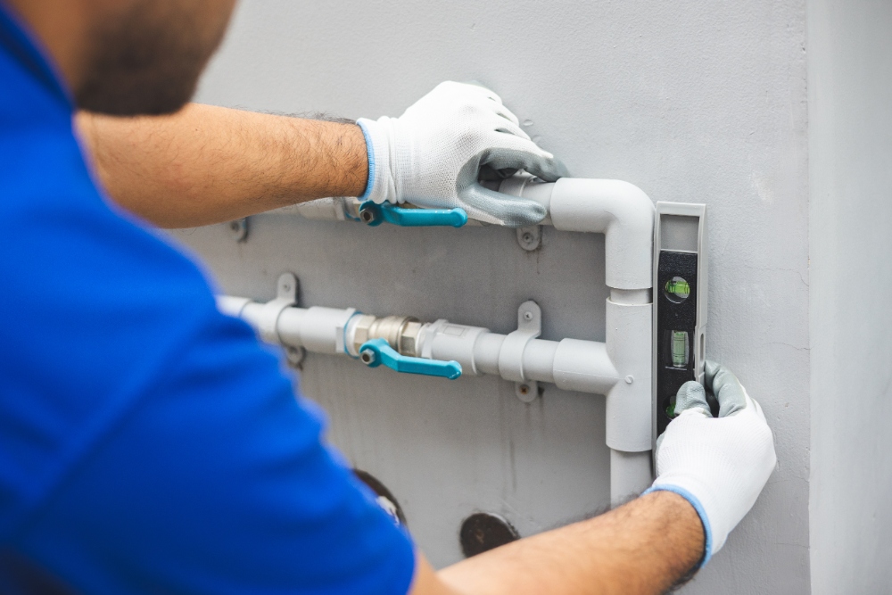 Worker using a level tool