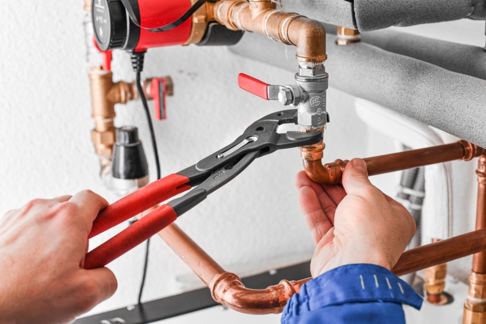 Adjusting plumbing with a wrench